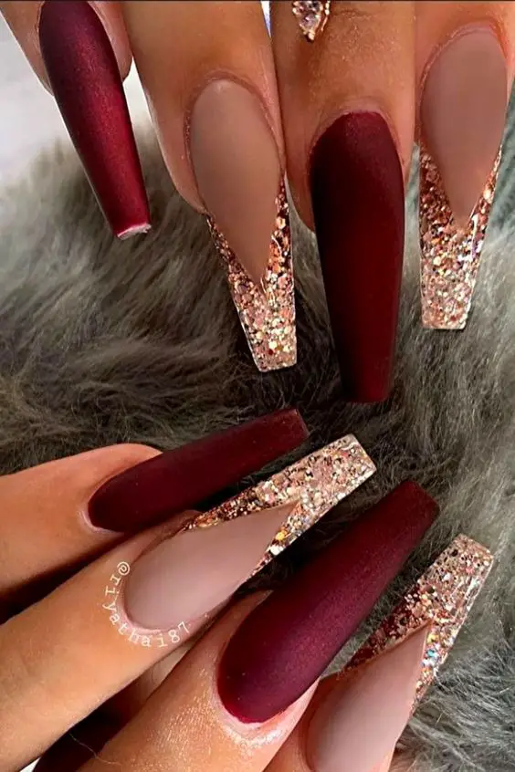 Red wine nails gold sparkle french tip
