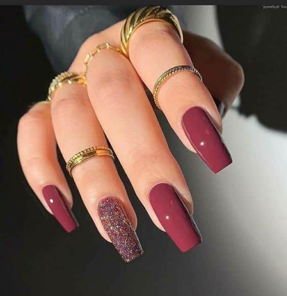 glossy burgundy and glitter accent nails