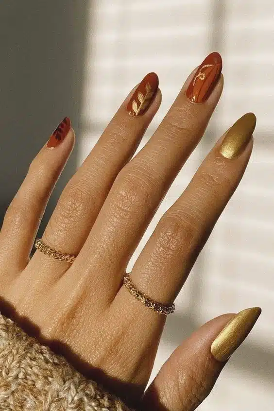 orange and gold leaf nails