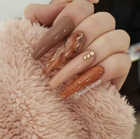 orange marble and gold nails