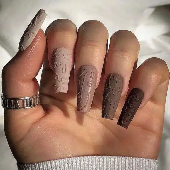 textured brown nails
