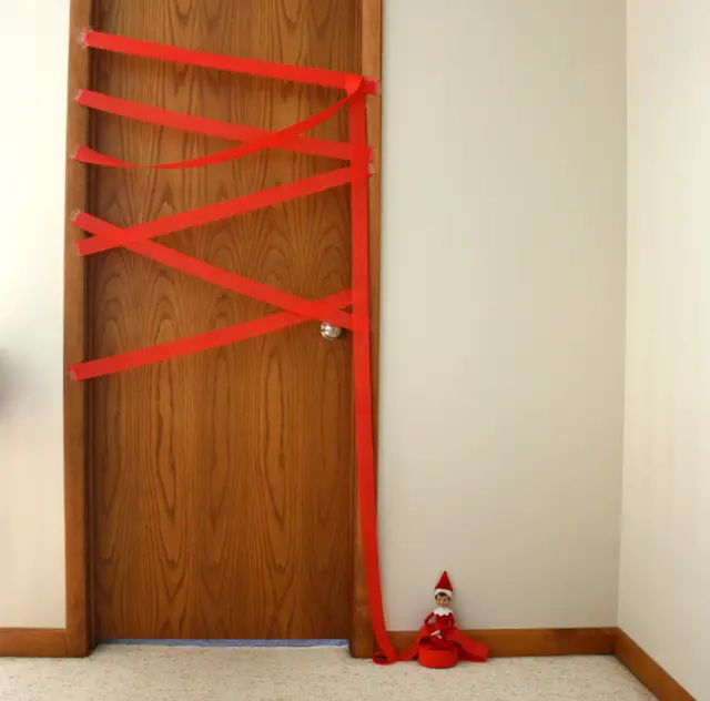Elf Makes Doorway Danger