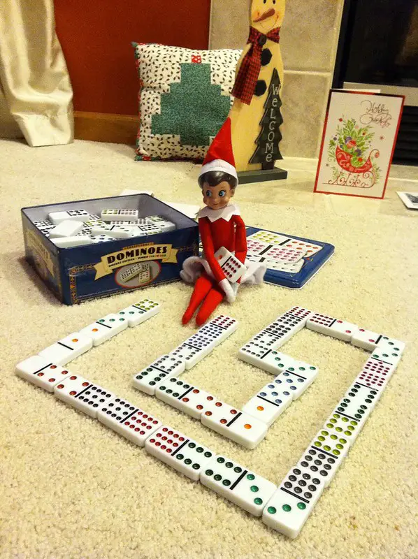 Elf Plays Dominoes