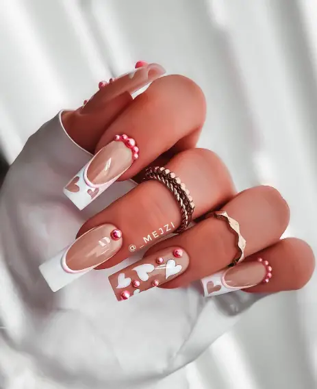 pink beads and white hearts nails