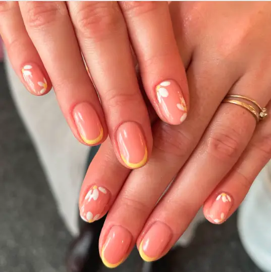 Yellow French Tips and Daisy nails